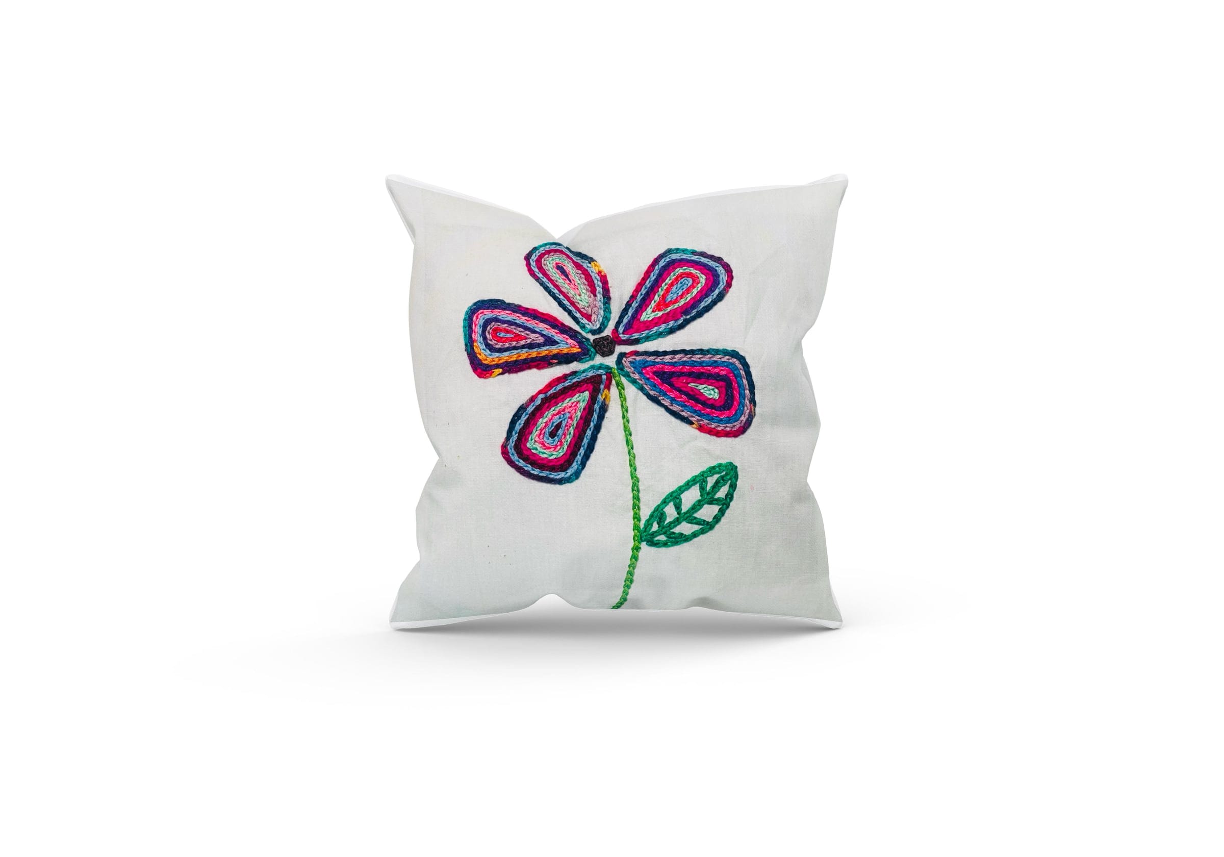 Single flower-embroidered cushion on a white background